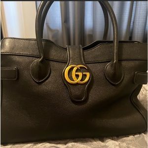 Gucci Convertible Medium Dahlia with magnetic, double G closure.